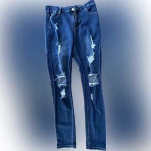 Women’s No Name Brand Distressed Skinny Jeans ,size listed is Medium Color Blue
